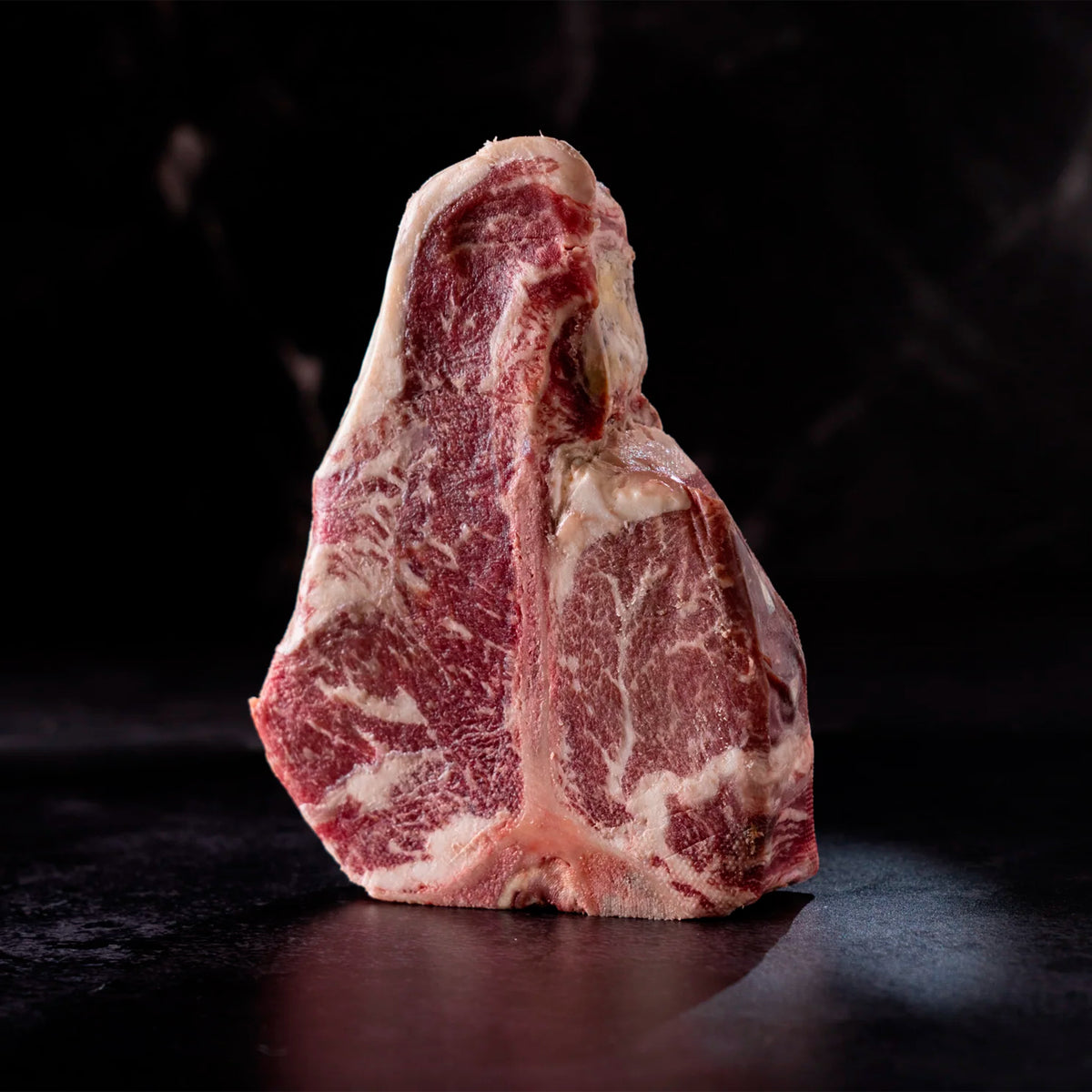 Porterhouse LHA Reserve Dry Aged — corte de pie con hueso en T | MEAT MX